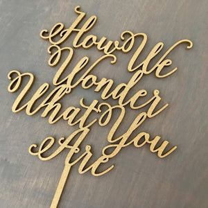 How We Wonder What You Are Cake Topper, 7"W